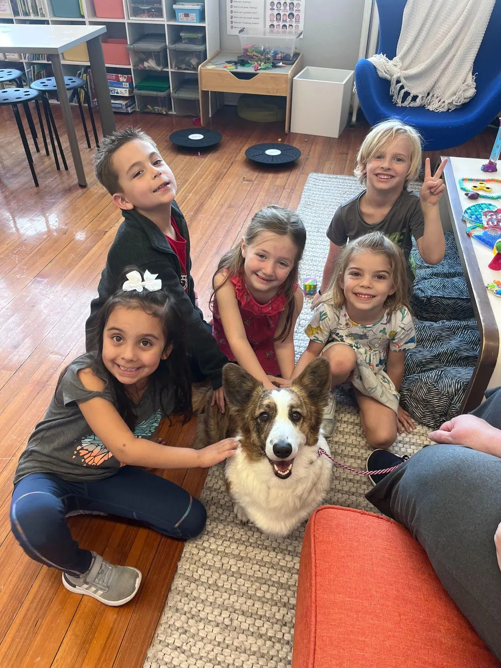 A group of students with a dog